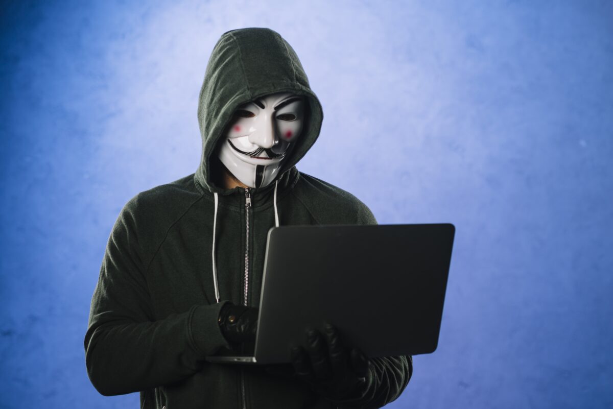 hacker-with-anonymous-mask-min